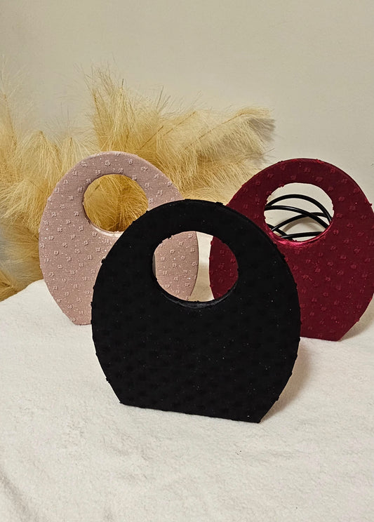 OVAL DETAIL HANDBAG